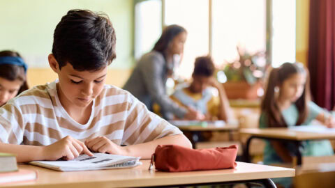 Students taking test in class